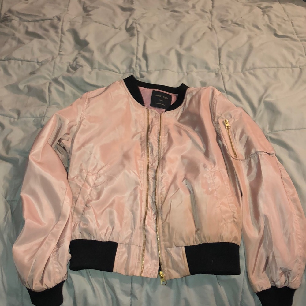 Slightly used light pink bomber.